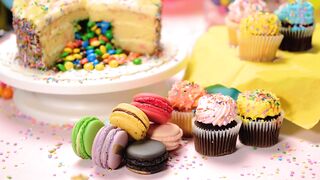Table of a birthday party with cake