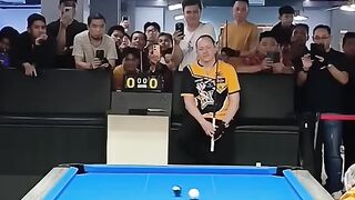 Man tricks audience that he missed the shot.