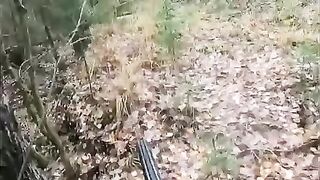 A forester meets a bear on his way while patrolling the forest