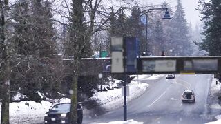 Snowing around a pedestrian bridge in Canada - adalinetv