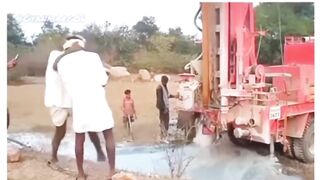 Farmer is very happy because they found water in his land