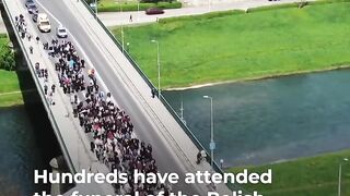 Hundreds attend funeral of Polish WCK worker killed by Israeli attack on Gaza _ Al Jazeera Newsfeed (1).