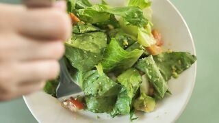Eating salad with a fork