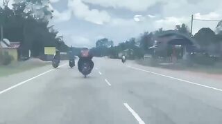 the big man took the blow by flying like a big rolling pig