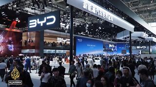 Beijing Auto Show_ China looks to expand dominance of EV market.