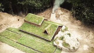 Building underground hut with glass roof and fire place with clay