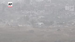 Military movement on Israel's border with Gaza Strip as efforts to secure cease-fire continue.
