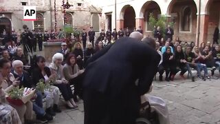 Pope Francis visits a women's prison in Venice.