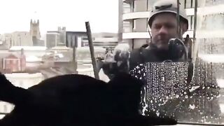 Having fun with the window cleaner