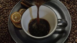 Pouring coffee in a cup