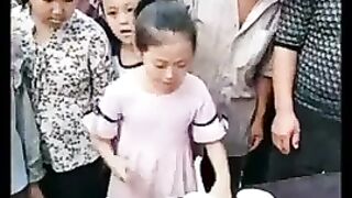 Little girl shows an up close magic trick