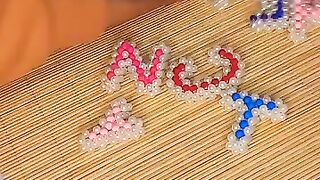 Letters of beads