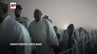 Samaritan community takes part in Passover pilgrimage on West Bank's Mount Gerizim.