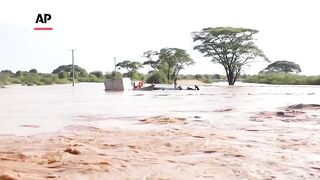 Boat capsizes in Kenya after flooding caused by heavy rain.