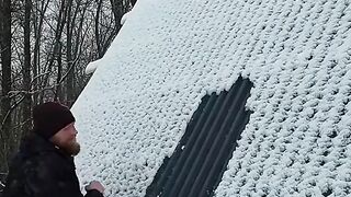 THE WAY THE SNOW FALLS OFF FROM THE ROOF