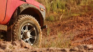 Off road car driving through mud - adalinetv