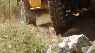 Close up of the tyres of an off road SUV - adalinetv