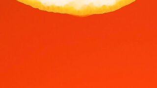 Orange slice on an orange background