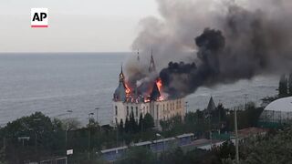 Fire rips through building in Odesa, Ukraine, after Russian missile strike.