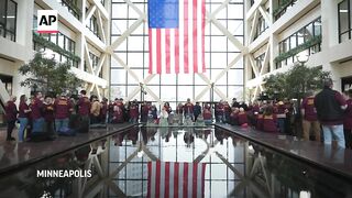 Dueling crowds rally at hearing for Minnesota trooper charged with murder.