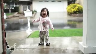 Little-Girl-Experiences-Rain-For-The-First-Time