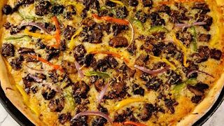 Caribbean oxtail pizza