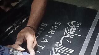 Making calligraphy on ceramic stone
