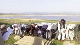 In Mangala Dam, everyone is taking oath at Awami Jahnar Action Committee Graveyard in Mirpur