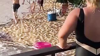 Australian surfer Mikey Wright saves a swimmer in high tides
