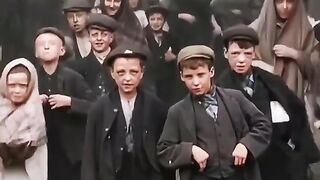 Kids on the streets of England perform for the camera 123 years ago in 1901