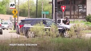 Police killed student outside Wisconsin school after reports of someone with a weapon, official says.