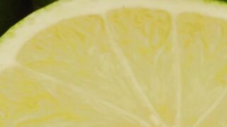 Lemons rotating in a cluster at a leisurely pace