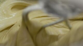 Close up shot of the inside of a mixer when mixing dough