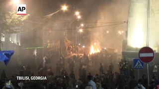 Georgian police deploy tear gas as protests over 'Russian law' continue in Tbilisi.