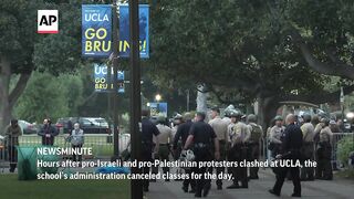 UCLA cancels classes after protesters clash on campus _ AP Top Stories.