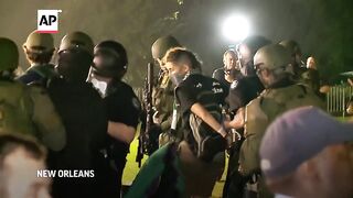 Police remove protesters from campus at Tulane University.