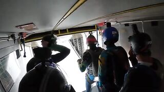 Attempting a 200 way skydiving formation at sunset_.