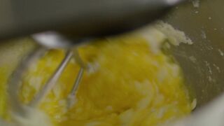 Interior of a mixer that mixes butter and eggs