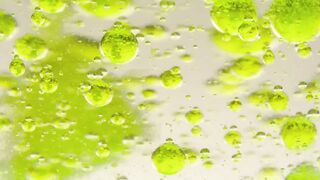 Thick green liquid in an abstract video - adalinetv