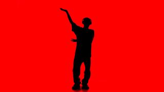 Silhouette of a dancer on a red background - adalinetv