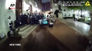 Body camera video shows NYPD entering building at Columbia University.