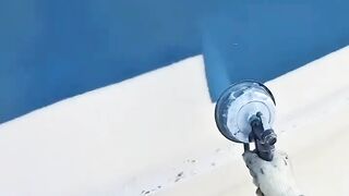 Painter satisfyingly gets it while casually hanging   Just when you see that spot the painter hits it