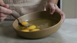 Chef beating eggs