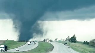 Cars Pull Over as Black Tornado Crosses Interstate in Nebraska