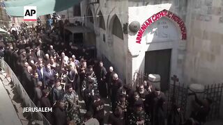 Orthodox Christian pilgrims mark Good Friday in the Old City of Jerusalem.