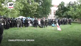Police break up encampment of pro-Palestinian protesters at University of Virginia.