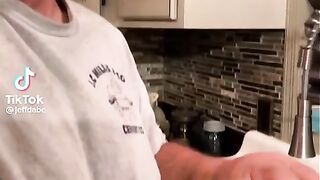 Jeff Dabe Arm Wrestling Champ Holding Normal Sized Objects in his Large Hands