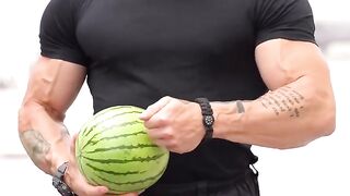 "A bodybuilder broke a watermelon."