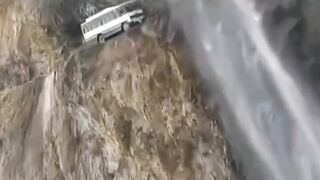 The vehicle is passing through a very dangerous road