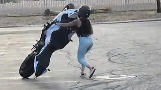 Check out the masti on the girl's heavy motorcycle